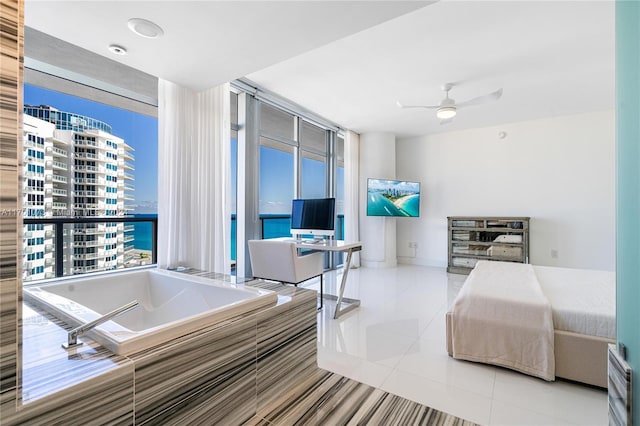 bedroom with tile patterned floors, floor to ceiling windows, and ceiling fan