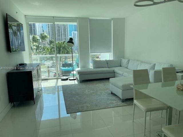 living room with light tile patterned floors