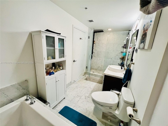 bathroom with vanity, an enclosed shower, and toilet