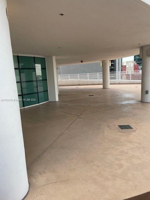 corridor featuring concrete floors