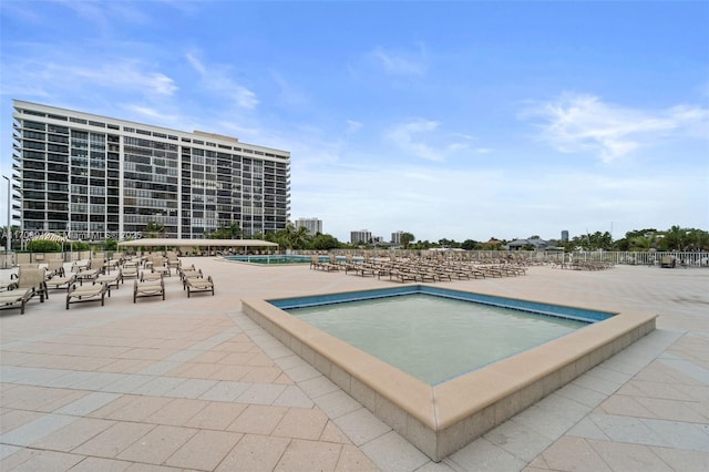 view of swimming pool featuring a patio