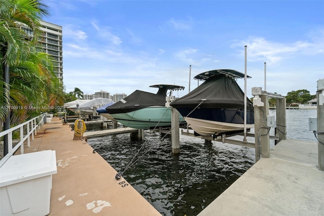 view of dock with a water view