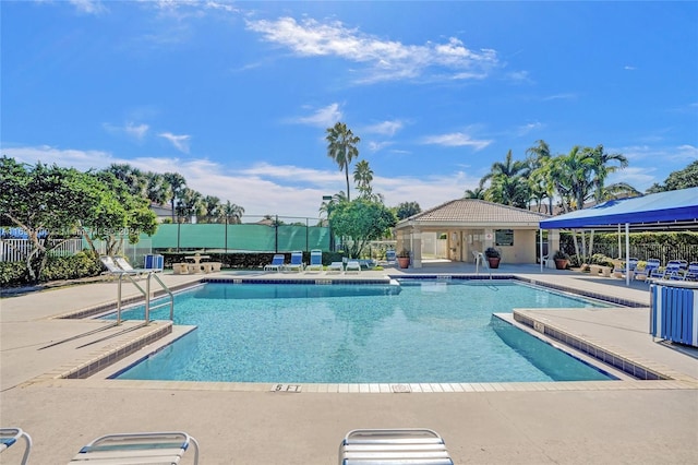 view of swimming pool with a patio