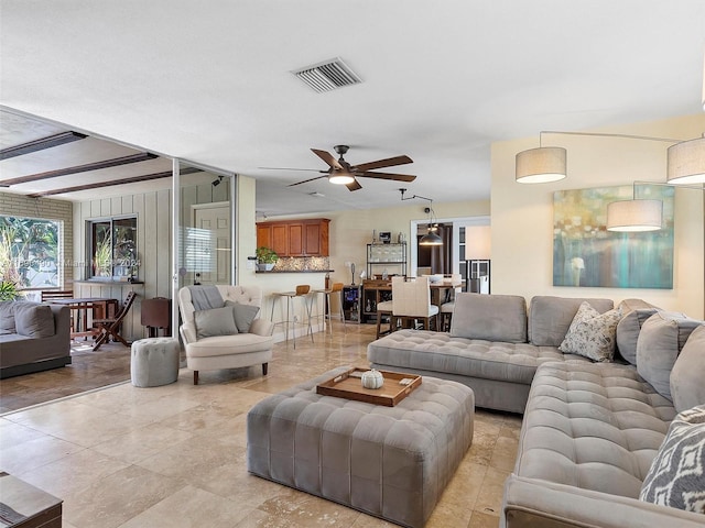 living room with ceiling fan