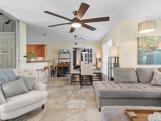 living room with ceiling fan