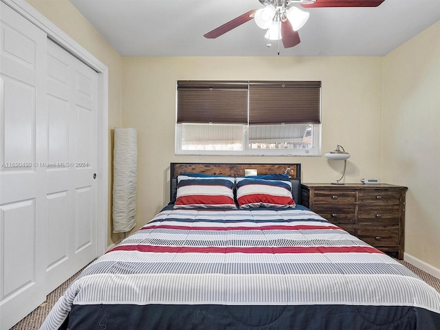 bedroom featuring ceiling fan and a closet