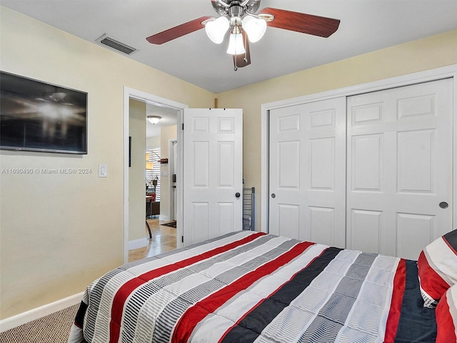 bedroom with a closet and ceiling fan