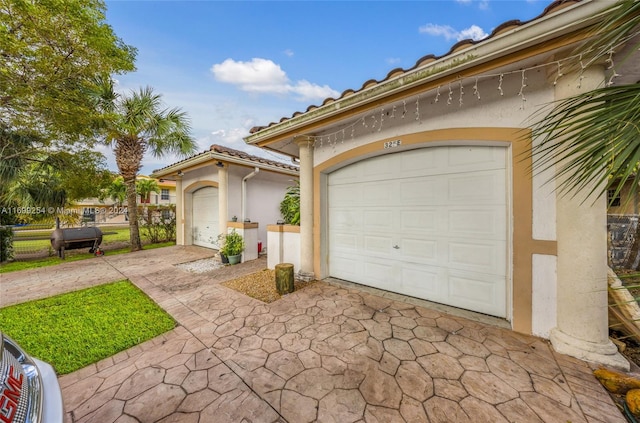 view of front of home with a garage