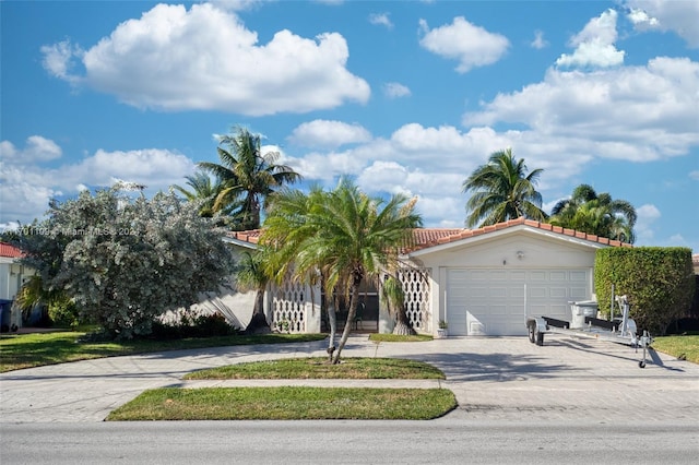 view of front of home with a garage