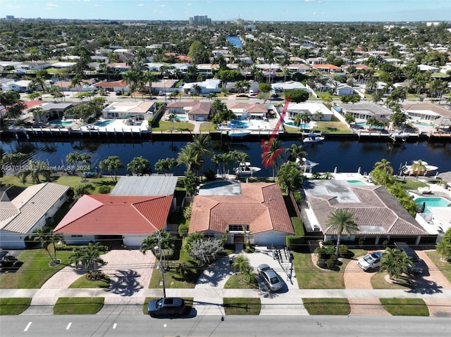 drone / aerial view with a water view