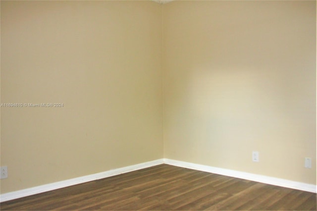 spare room featuring hardwood / wood-style floors