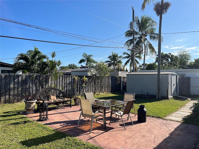 view of patio / terrace featuring a storage shed