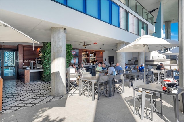 view of patio featuring ceiling fan