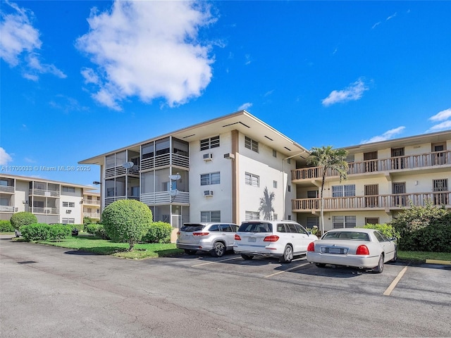 16701 NE 13th Ave Unit 101, Miami, FL 33162 - view of apartment building / complex with uncovered parking