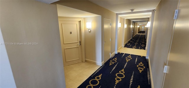 hallway with light tile patterned flooring