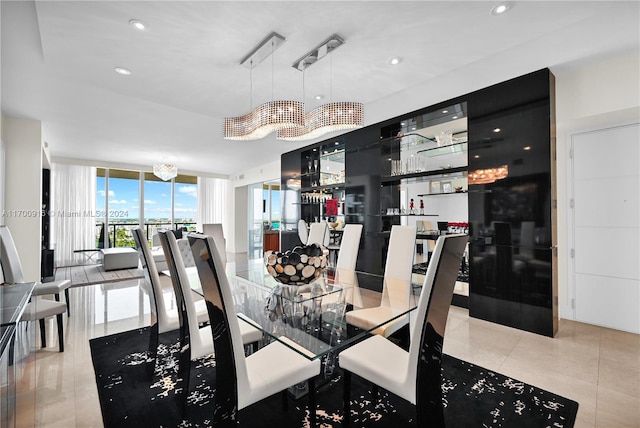 tiled dining room with expansive windows