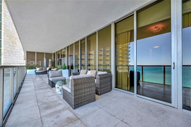 view of patio with a balcony and an outdoor hangout area