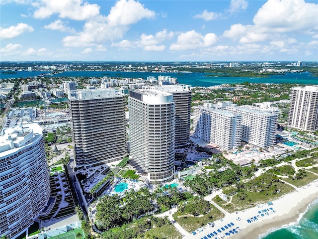 drone / aerial view with a view of the beach and a water view