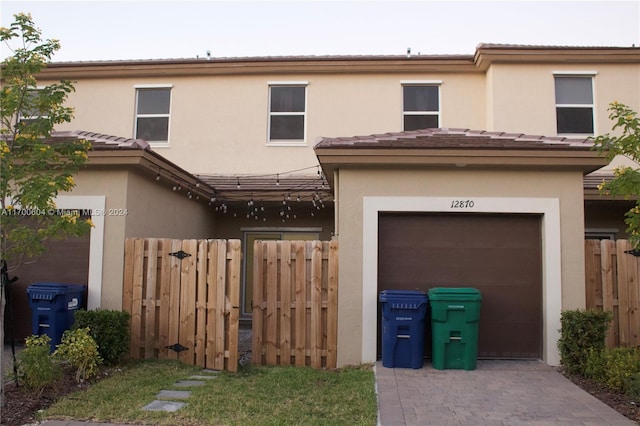 view of front of house with a garage