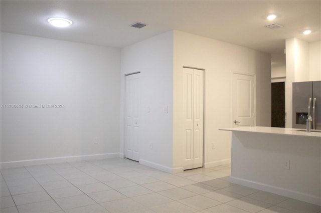 view of tiled spare room