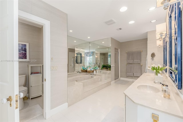 bathroom featuring a tub, tile patterned flooring, tile walls, and toilet