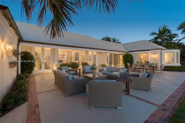 view of patio with french doors and an outdoor hangout area