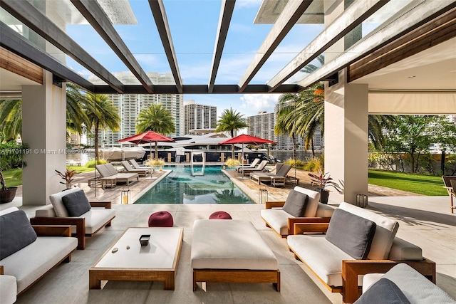 view of swimming pool with a pergola, a patio, and an outdoor hangout area