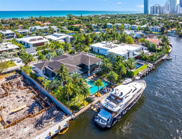 drone / aerial view with a water view