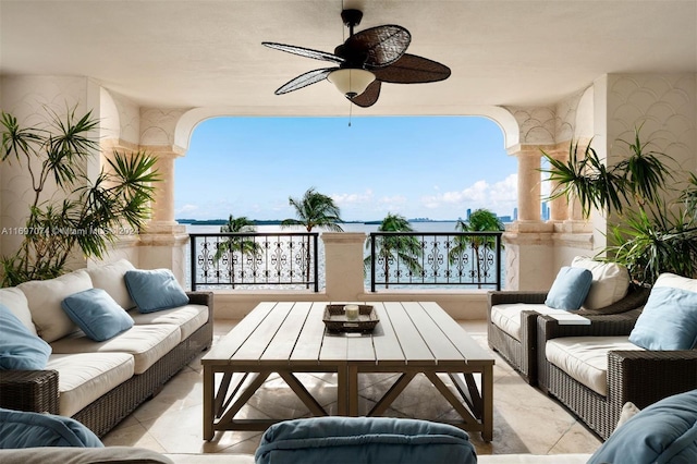 balcony featuring ceiling fan and an outdoor hangout area