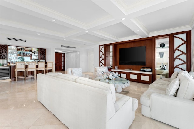 living room with beam ceiling, coffered ceiling, wine cooler, bar area, and crown molding