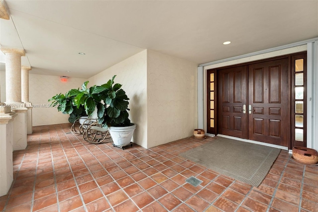 entrance to property featuring a porch