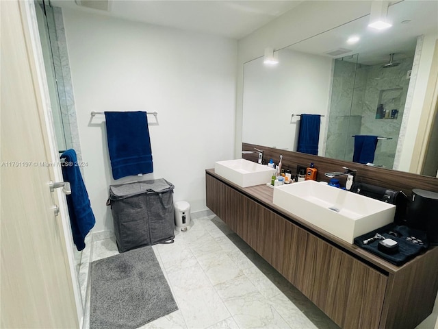 bathroom with vanity and a shower with shower door