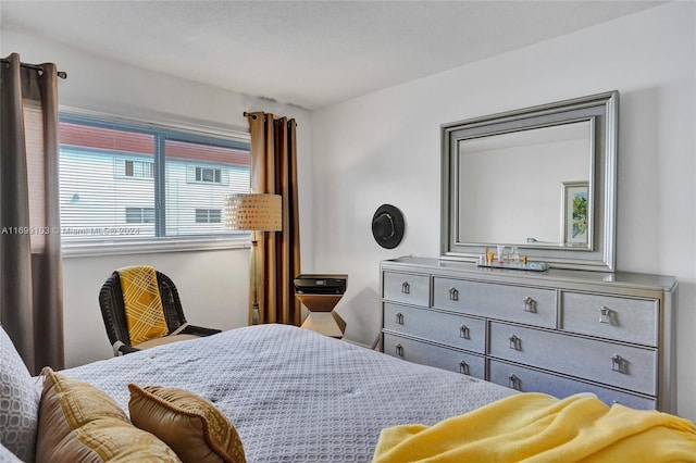 bedroom featuring a textured ceiling