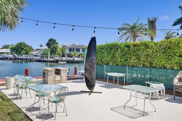 view of patio / terrace with a water view