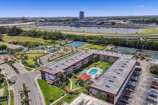 birds eye view of property with a water view