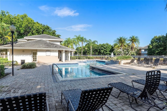 view of swimming pool featuring a patio