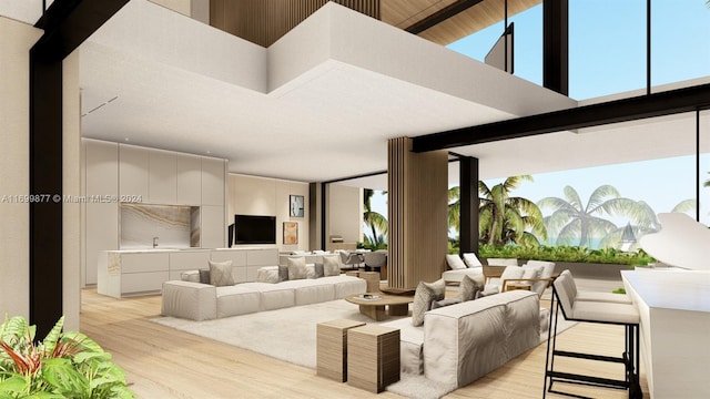 living room featuring beamed ceiling, a towering ceiling, and light hardwood / wood-style flooring