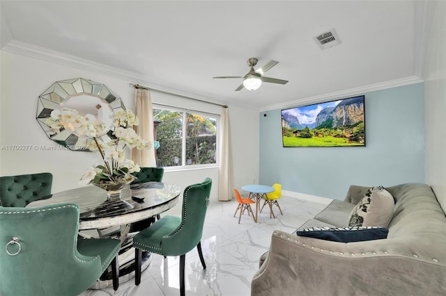 dining space featuring crown molding and ceiling fan