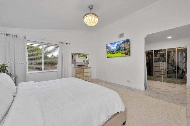 bedroom featuring lofted ceiling, crown molding, and a closet