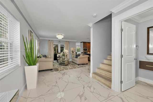 hall featuring crown molding and french doors