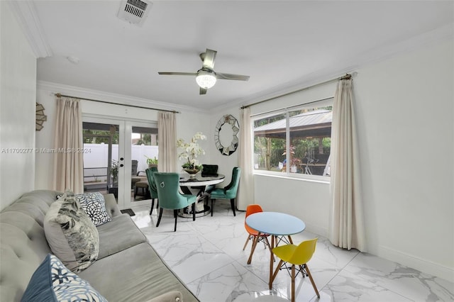 dining room with french doors, ceiling fan, and ornamental molding