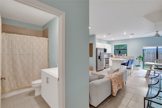 887 NE 211th St Unit 887, Miami, FL 33179 - interior space featuring a ceiling fan, recessed lighting, and light tile patterned floors