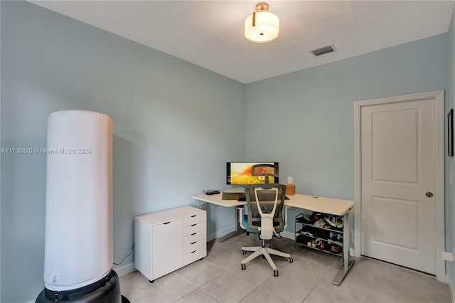 887 NE 211th St Unit 887, Miami, FL 33179 - office area with light tile patterned floors, visible vents, and baseboards