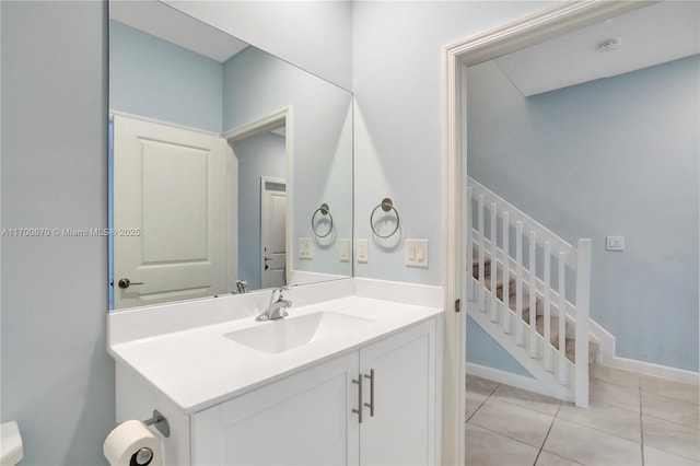 887 NE 211th St Unit 887, Miami, FL 33179 - bathroom with vanity, baseboards, and tile patterned floors