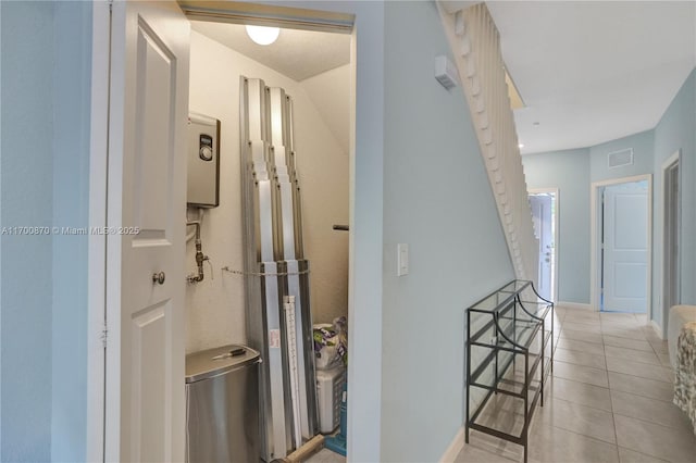 887 NE 211th St Unit 887, Miami, FL 33179 - hall featuring baseboards, visible vents, and light tile patterned flooring