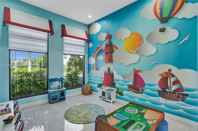887 NE 211th St Unit 887, Miami, FL 33179 - game room with tile patterned flooring and baseboards
