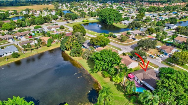 drone / aerial view featuring a water view