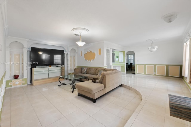 tiled living room featuring ornamental molding