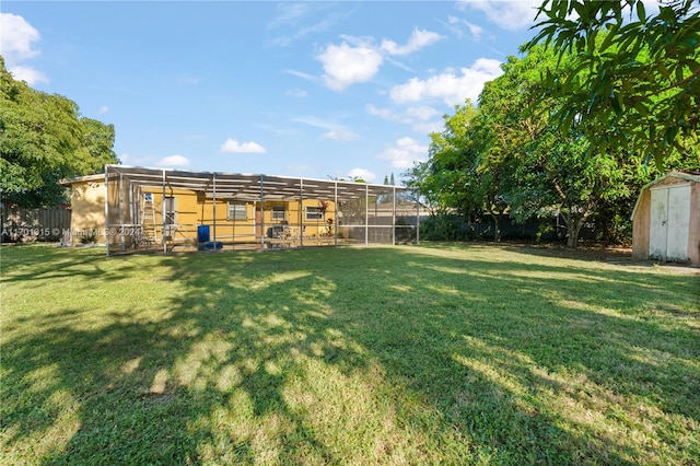 view of yard featuring a storage unit