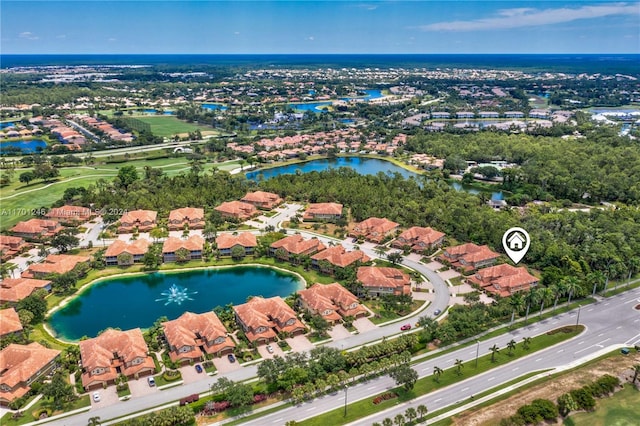 drone / aerial view featuring a water view